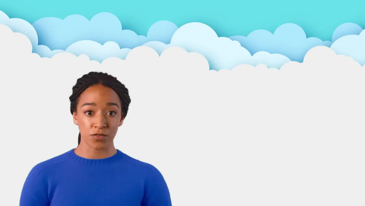 The presenter under a layer of paper-cut clouds