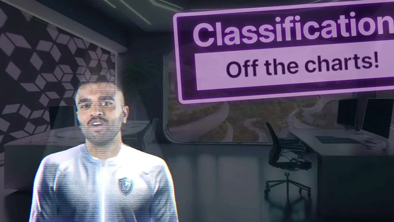 A Guardian presenter beside a sign: classification, off the charts